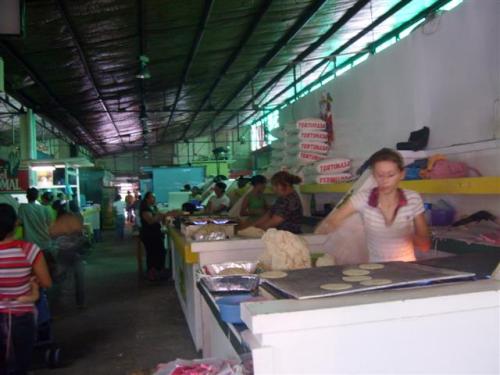 Making tortillas at the back of the Guamilito Market in San Pedro Sula, Honduras